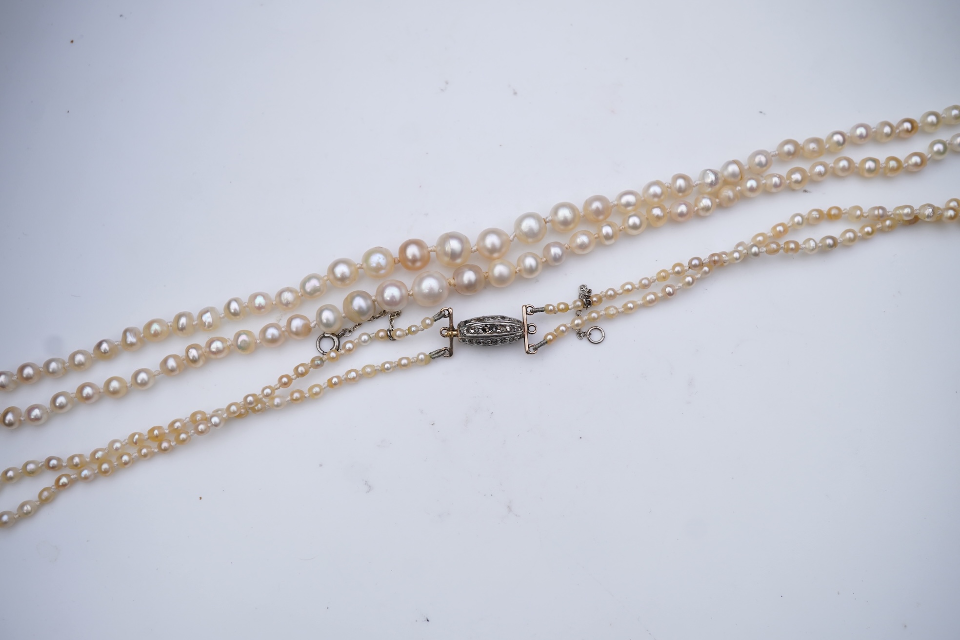 A natural pearl and diamond necklace, early 20th century
